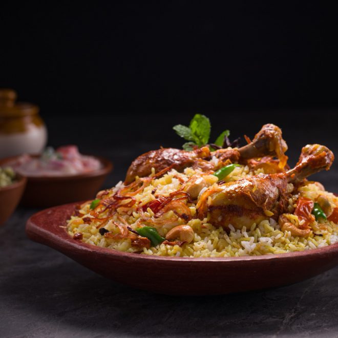 chicken-dhum-biriyani-using-jeera-rice-spices-arranged-earthen-ware